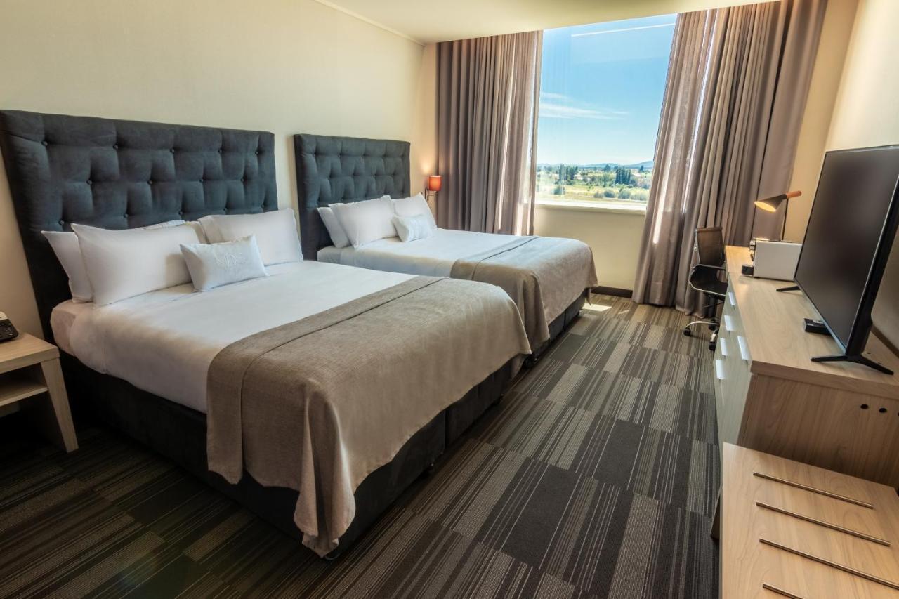 Mds Hotel Chillan Bagian luar foto A room at the hotel